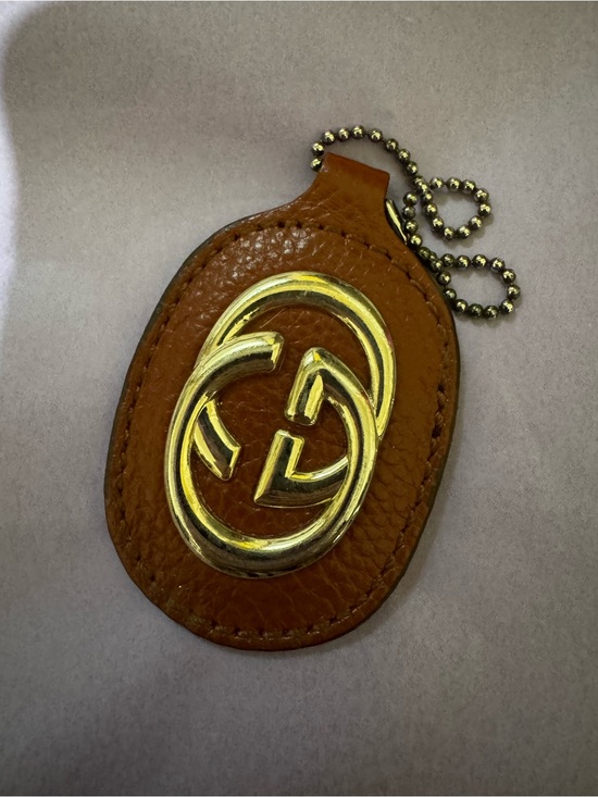 Gucci Accessories - Gucci Sukey Hang Tag with Gold GG Emblem - Brown